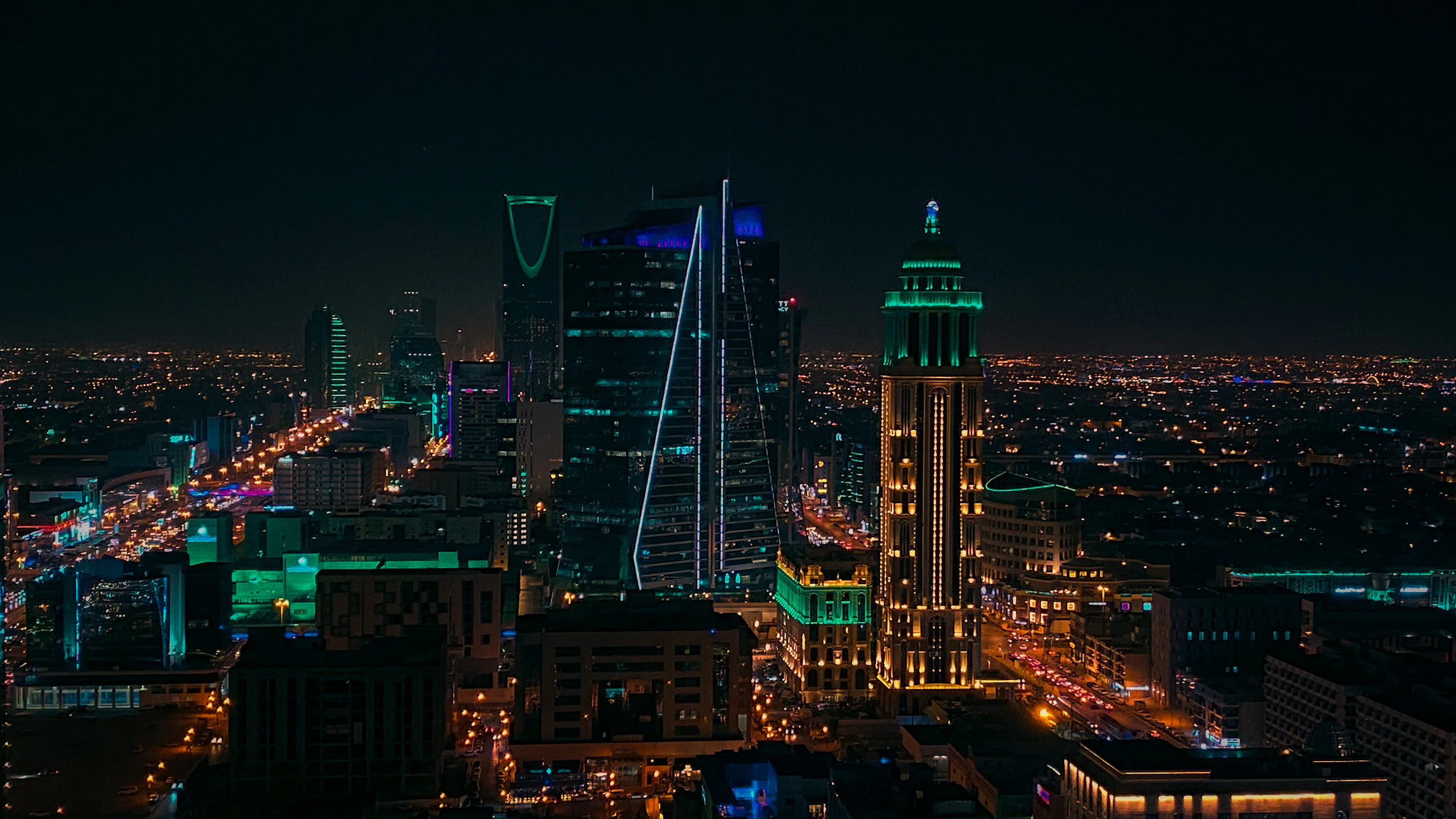 Riyadh skyline at night with Kingdom Centre lit up